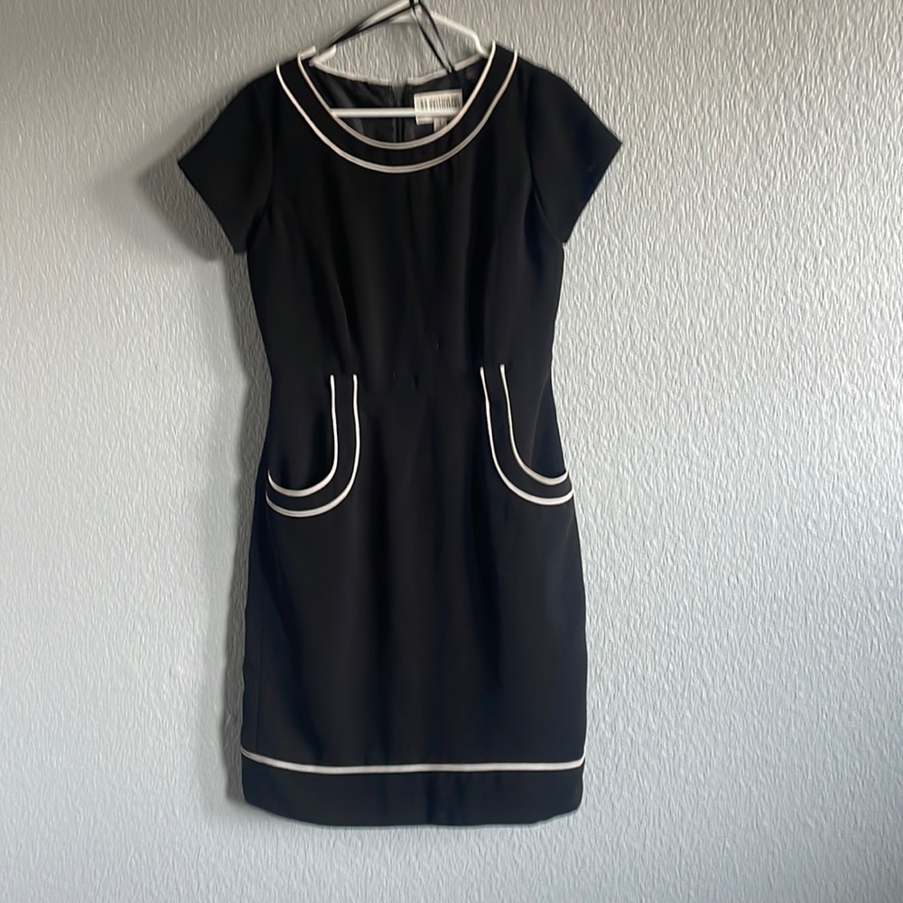 Black Julian Taylor dress with pockets on the side. Perfect for work